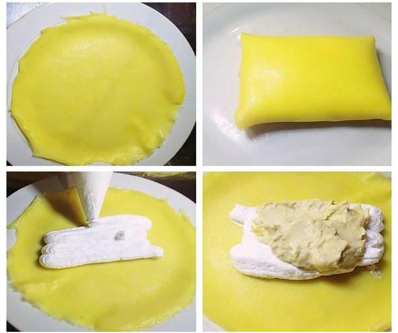 Cho hỗn hợp kem tươi, sầu riêng tán nhuyễn vào vỏ và gói bánh crepe